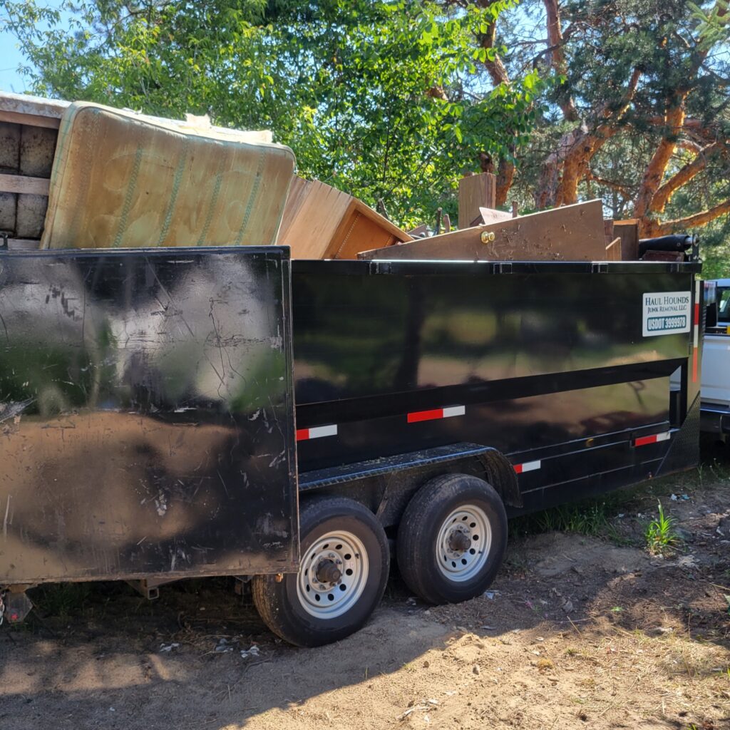 A trailer full of bulky junk furniture. Foreclosure clean out services in Minnesota