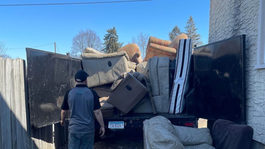 A house clean out featuring a full load of furniture.